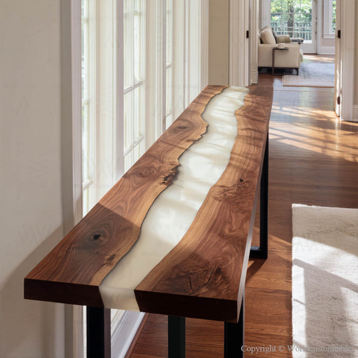 Black walnut white resin epoxy console table in an entryway