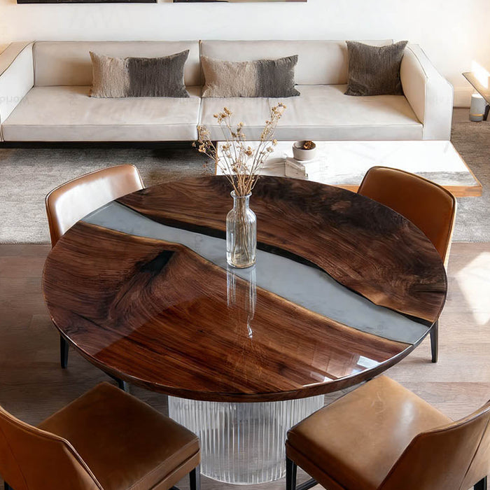 Modern dining room with a wooden table and chairs in a stylish living area.