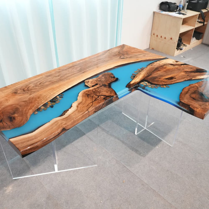 Blue epoxy black walnut corner desk with natural wood grain