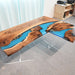 Blue epoxy black walnut corner desk with natural wood grain