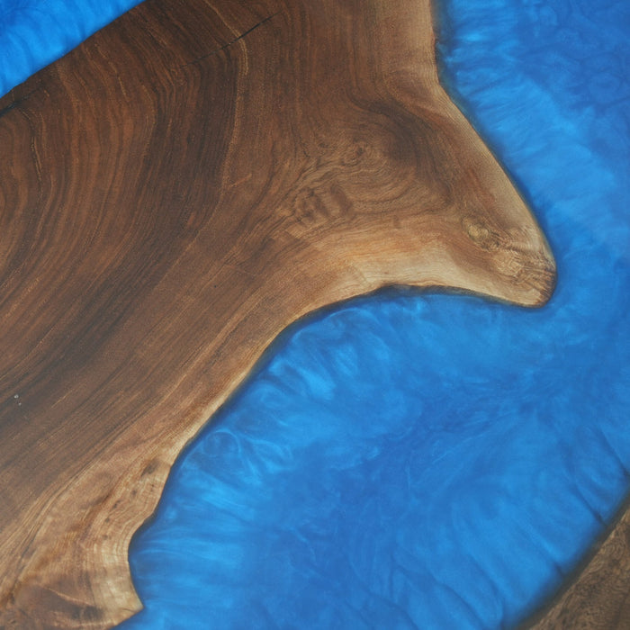 Custom epoxy resin table featuring vibrant colors and unique patterns, ideal for contemporary living spaces.