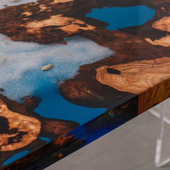 Blue epoxy resin table with burl walnut wood and beach wave design