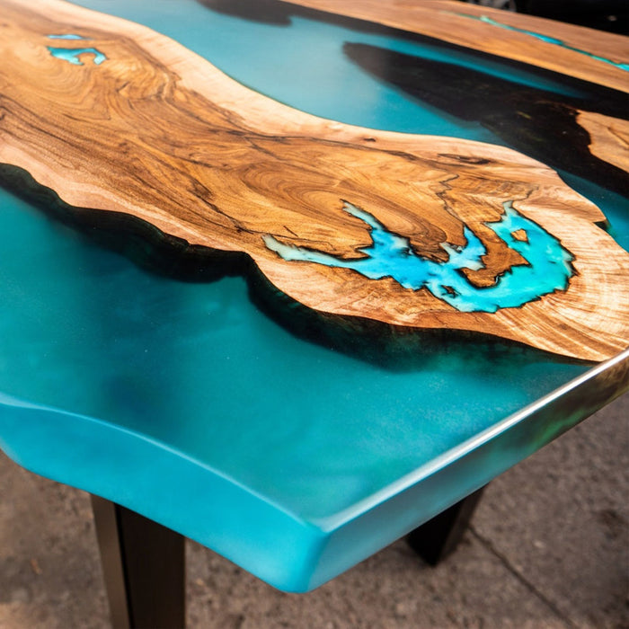 Blue epoxy live edge table crafted from natural walnut