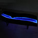 Top view of a walnut LED epoxy table with glowing blue resin river.