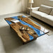 golden camphor coffee table with vibrant blue epoxy resin