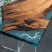 Blue ocean resin river table with live edge olive wood