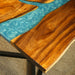 Custom walnut river epoxy table with blue resin for dining room