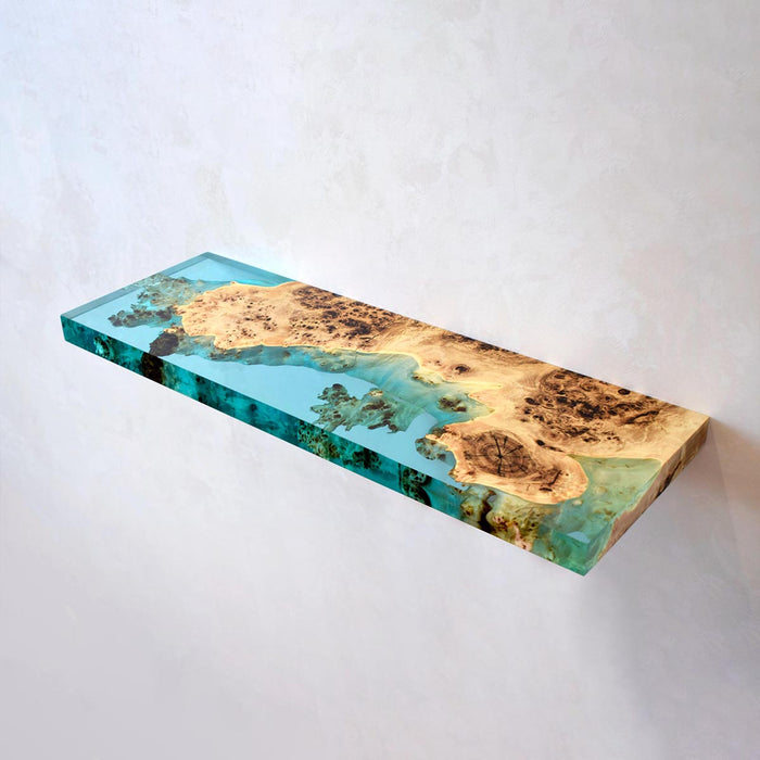 Wooden surface with a blue resin finish on a white background