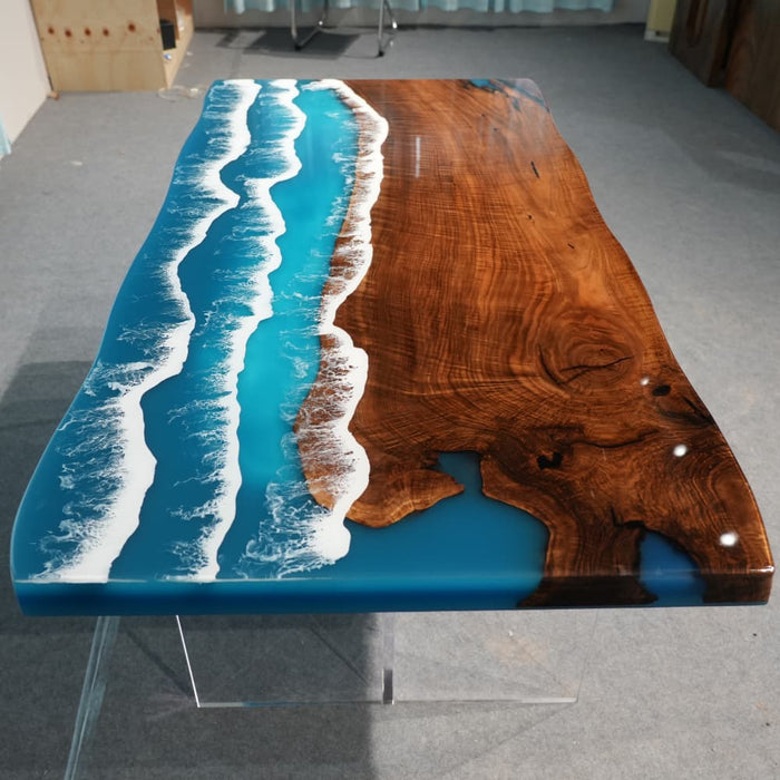 Blue and white epoxy live edge dining table with ocean wave design