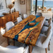 Dining room with a wooden table featuring a blue resin design, surrounded by chairs.