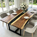 Modern California home featuring a walnut dining table with a black resin center design.