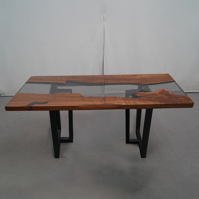 natural walnut dining table featuring transparent epoxy resin