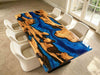 Coastal modern dining table with natural olive wood grain and vivid blue epoxy river, durable waterproof tabletop for dining room