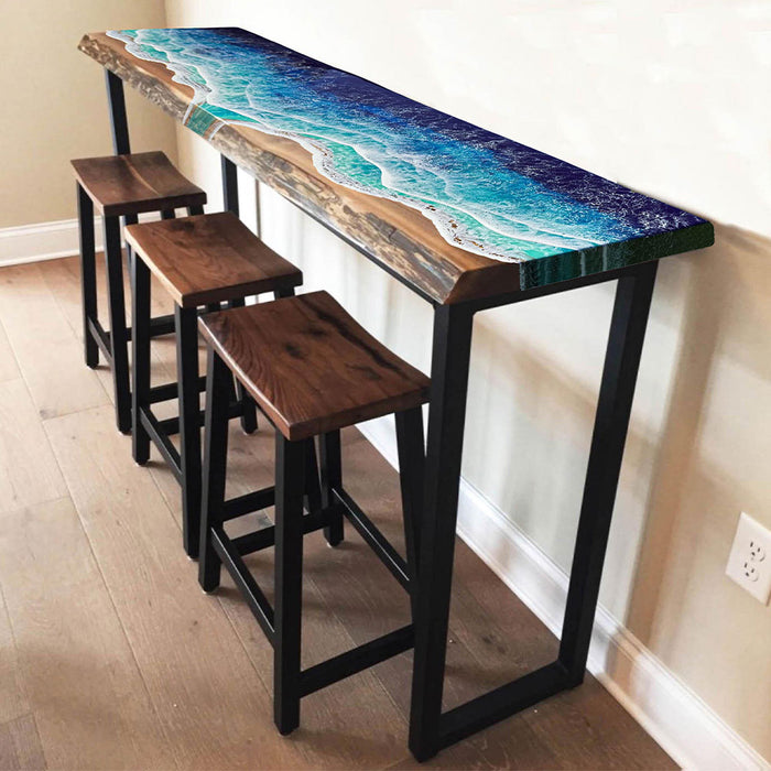 Coastal-style resin and wood high bar table set with matching stools, perfect for kitchen islands or patios.
