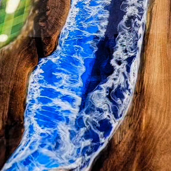Coastal-inspired resin wood table with realistic ocean wave design
