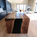 Contemporary black epoxy dining table displayed as centerpiece
