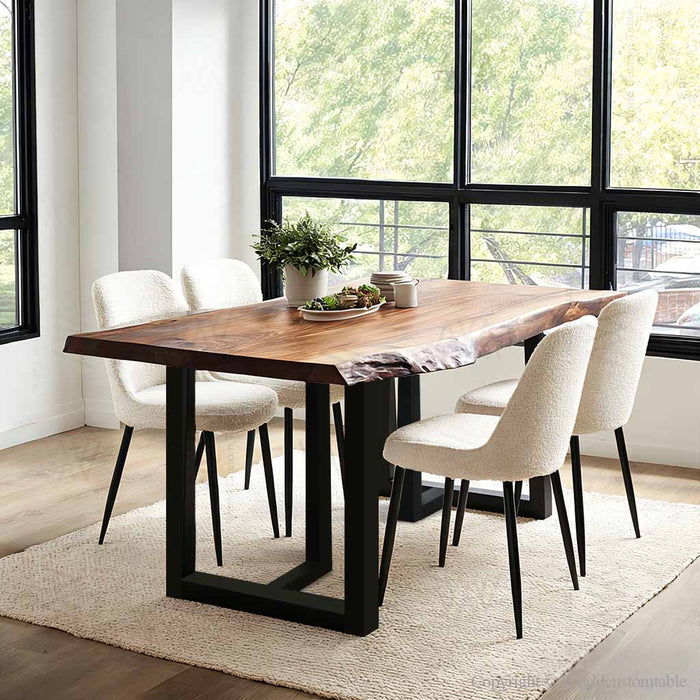 Dining room with a wooden table and white chairs on a beige rug.
