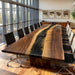 Walnut epoxy river table used in a professional corporate meeting room