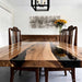 Custom black walnut epoxy dinning table in dining room