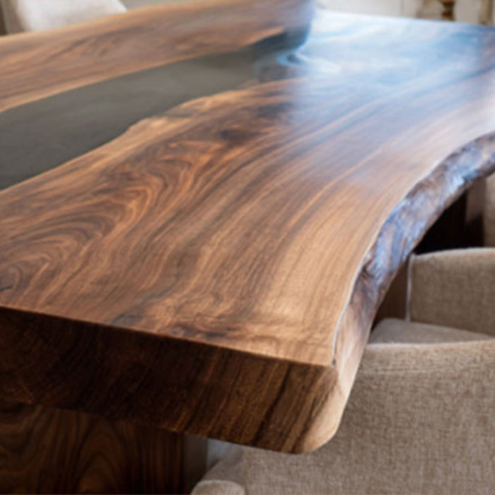 Custom black walnut resin dining table for contemporary interiors.