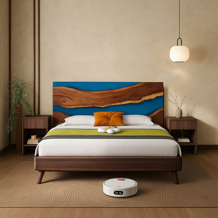 Modern bedroom with wooden bed, colorful headboard, and robot vacuum cleaner.