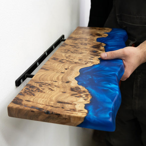 Custom handcrafted blue epoxy and natural wood live edge floating shelf for living room and home decor