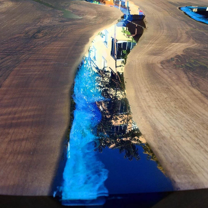 Custom dining table with clear epoxy river design