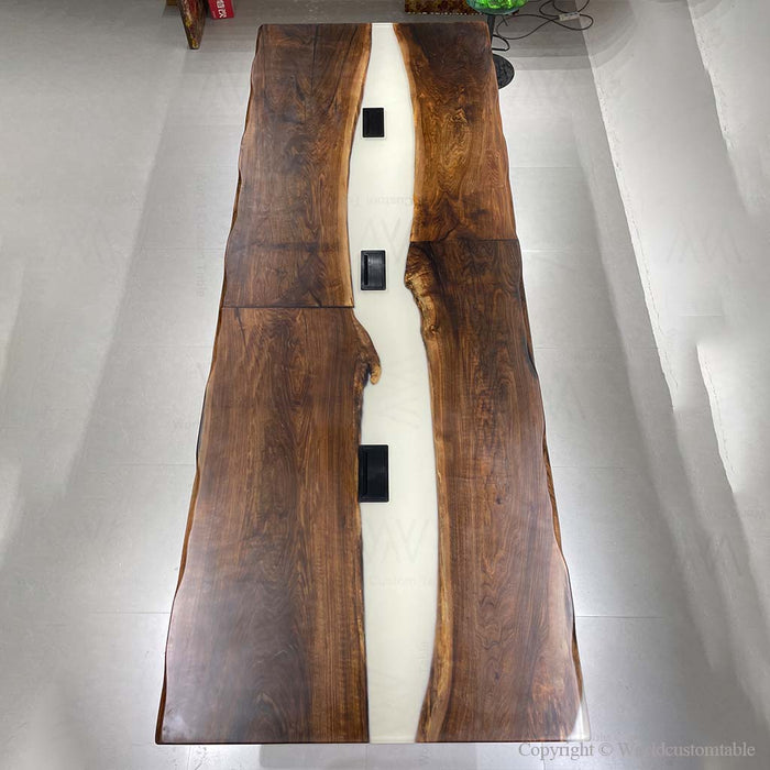 Custom epoxy conference table designed for US offices combining natural wood craftsmanship and modern functionality.