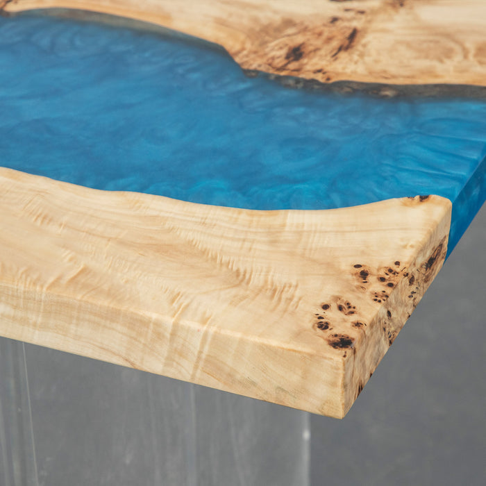 Live edge epoxy river dining table with natural poplar and vibrant blue resin