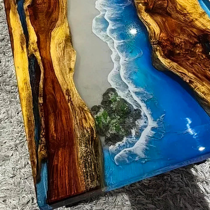 Custom epoxy river dining table with coastal ocean look