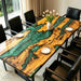 Custom olive wood table featuring a vibrant green epoxy resin river
