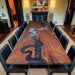 Custom grey epoxy river table with walnut wood and modern design