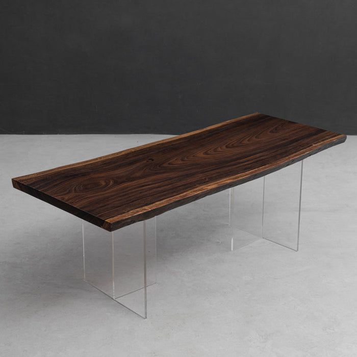 Custom live edge table featuring a single piece of South American rain tree with unique wood grain.