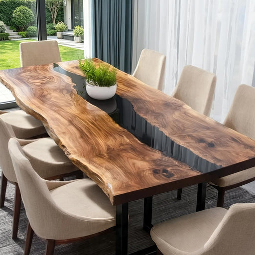 Custom walnut live edge table with resin center in a contemporary home setting.