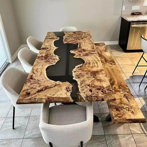 Stunning live edge burl wood dining table with matching bench, featuring a bold black resin river design and modern metal X-frame legs, perfect for luxury outdoor and indoor spaces.