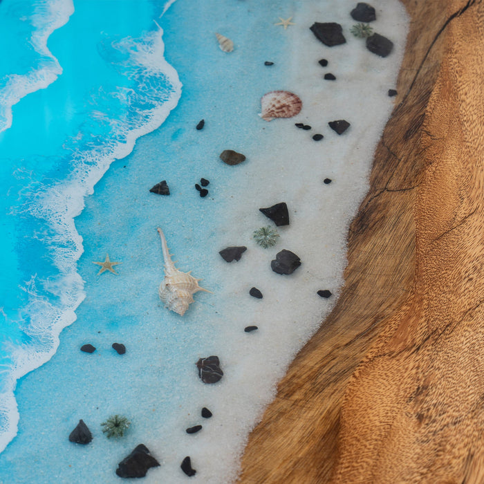 Custom ocean layering epoxy table made from walnut wood and blue resin waves