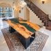 Custom epoxy resin table made with solid olive wood