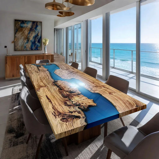Dining table with blue resin inlay in a modern room with ocean view