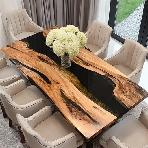 Custom artisan olive wood table with resin elements showcasing natural wood patterns.