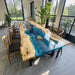 Custom epoxy conference table with ocean blue river and live edge poplar wood