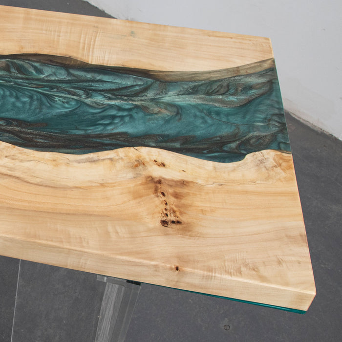 Custom epoxy river table with swirling green resin and natural poplar