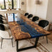 Sustainable luxury poplar burl dining table with blue resin for high-end restaurants.