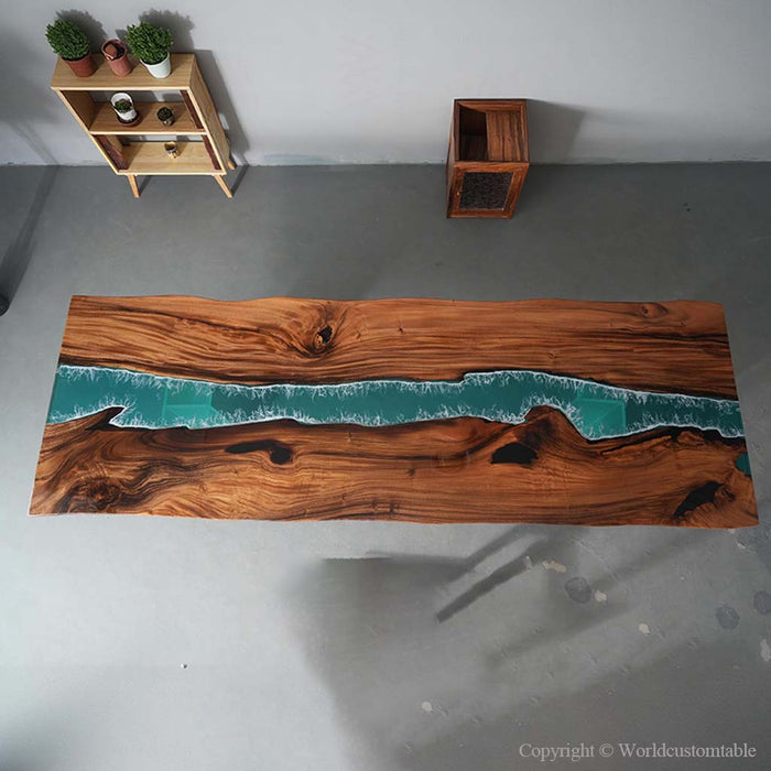 Custom river epoxy dinning table showcasing rich walnut wood grain