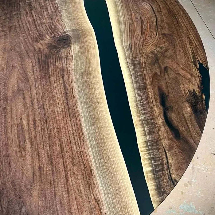 Custom epoxy and walnut wood round coffee table for living space