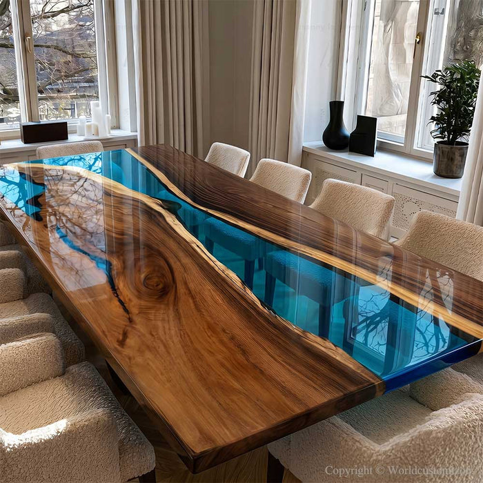 Dining table with wooden surface and blue resin inlay in a modern interior setting.