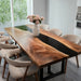 Custom walnut conference table with black epoxy resin river and executive design