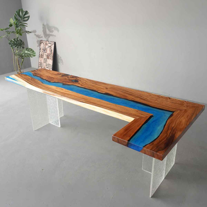 Custom walnut kitchen island with mysterious blue epoxy resin for modern homes