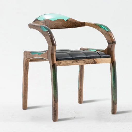 Wooden chair with green accents on a white background