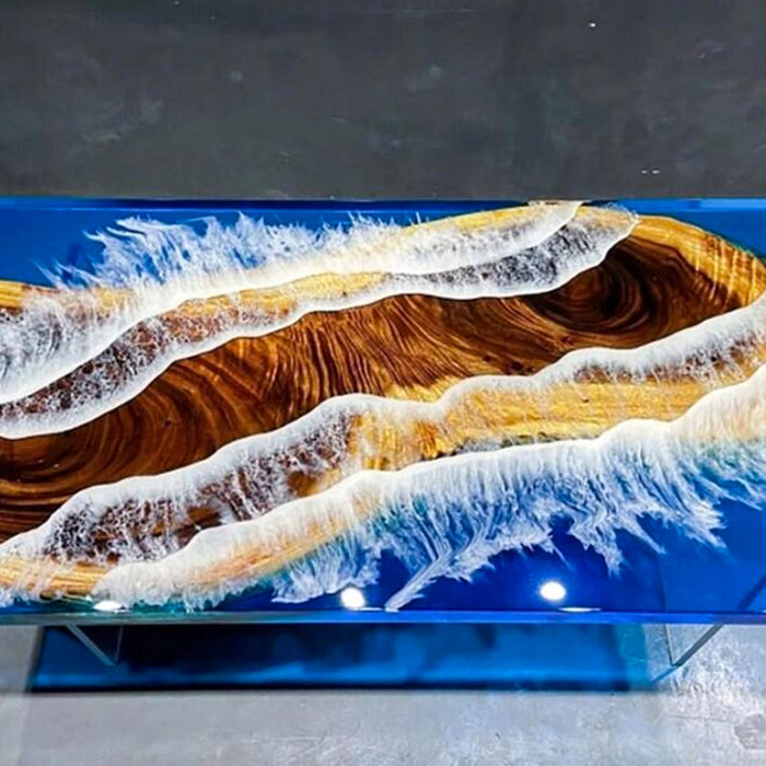 Epoxy resin table with wood and glass design on a dark background