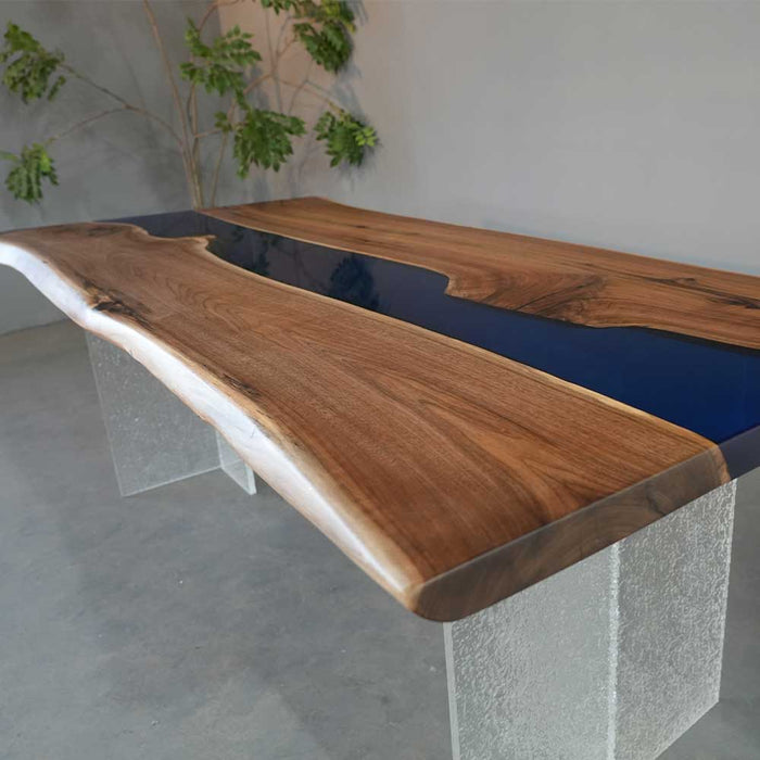 Modern custom wood and resin table ideal for office and meeting spaces.